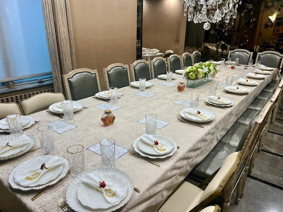 True elegance meets total protection. This custom tablecloth is paired with a Table Pads Pro protector, combining the style you love with 550°F heat resistance. It’s the secret to keeping your fine furniture beautiful for decades.
